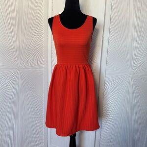 SOPRANO - Vibrant Red/Orange form-fitting extra small sundress.